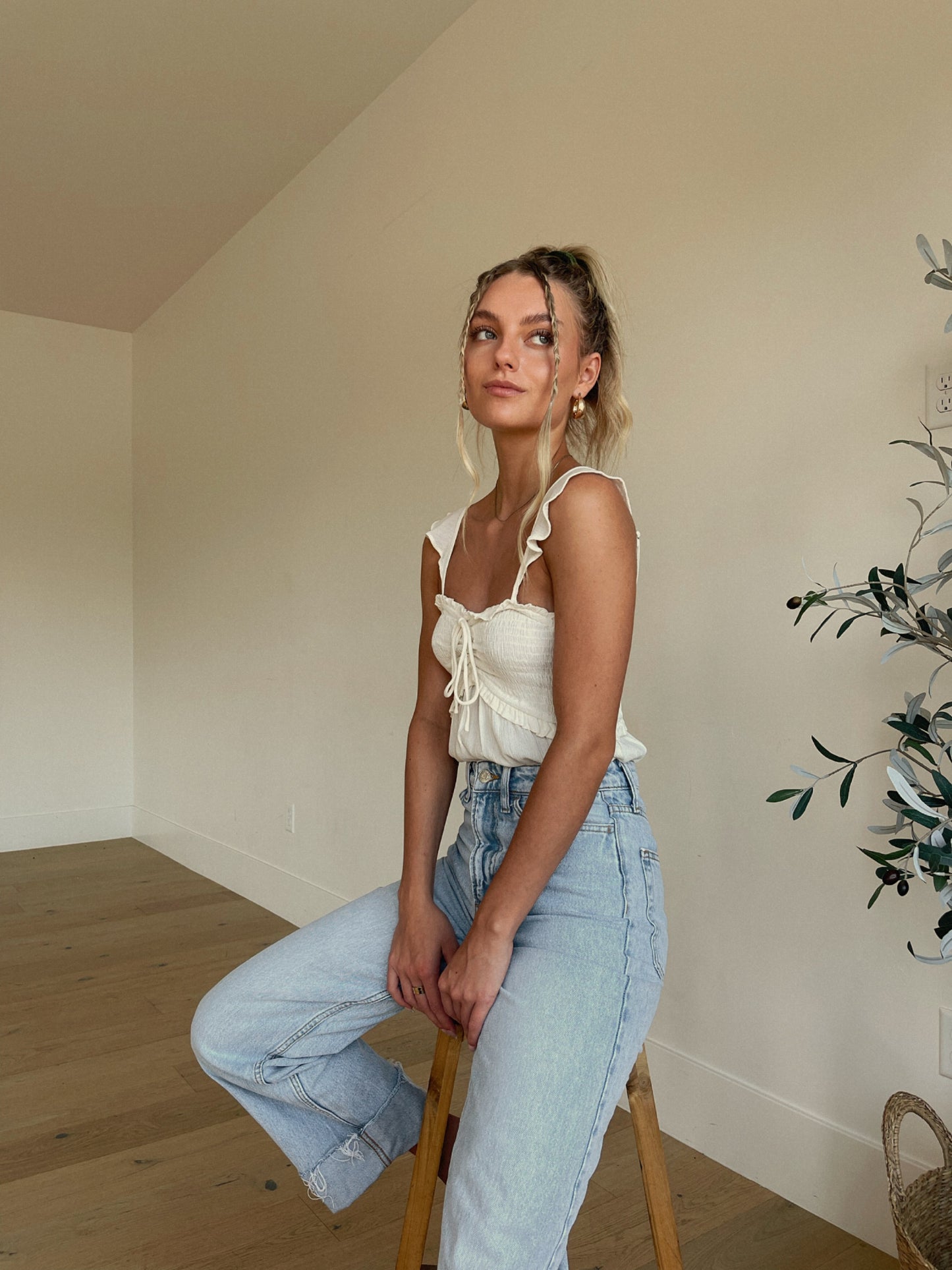 Ruffled In White Bodysuit