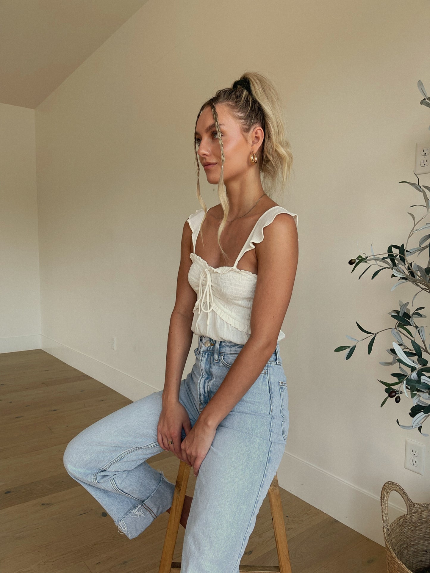 Ruffled In White Bodysuit